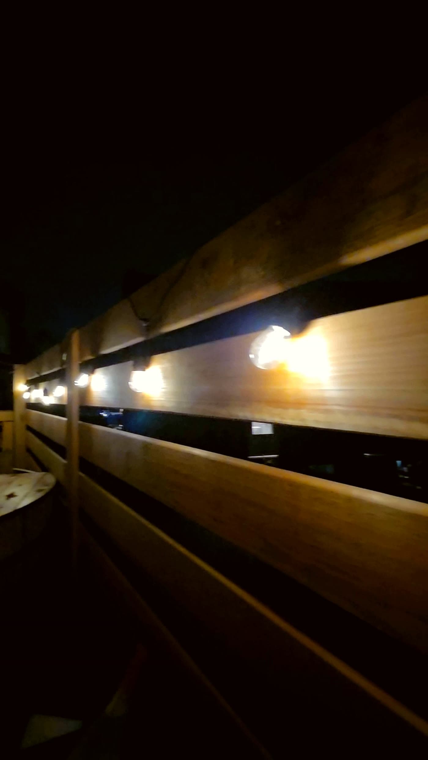 Cedar hot tub deck ambiance with string lights